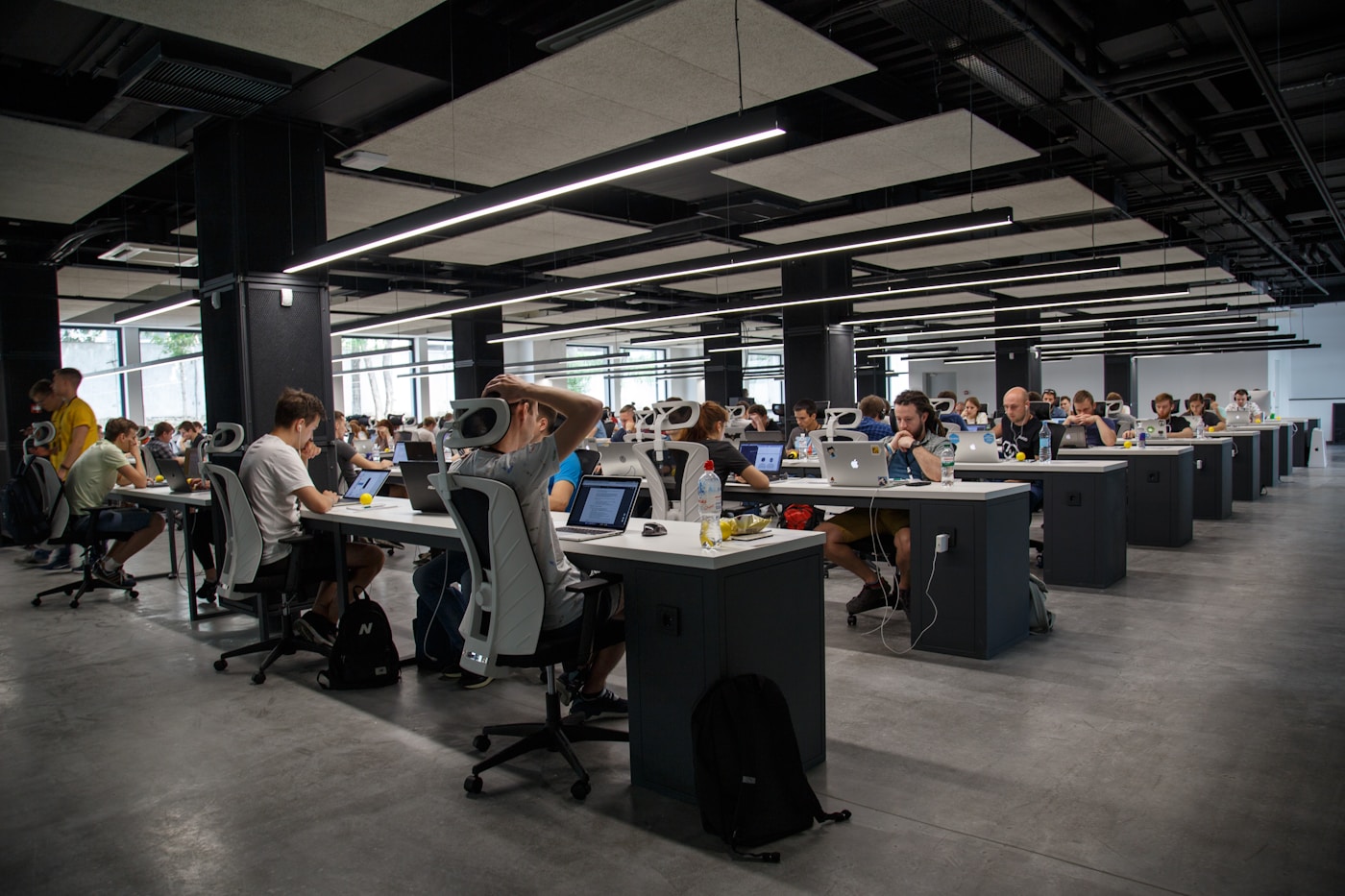 Technology team collaborating in a warm modern workspace